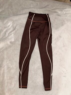 Buffbunny brown line detail leggings size small
